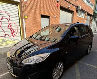 Přední pohled na pronájem Mazda 5 v Barceloně, Španělsko ✓ Auto č. 10932. ✓ Převodovka Manuální TM ✓ Recenze 0.