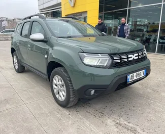 Aluguel de Carro Dacia Duster #11505 com transmissão Manual no aeroporto de Tirana, equipado com motor 1,5L ➤ De Leonard na Albânia.