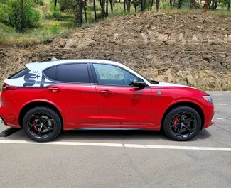 Alfa Romeo Stelvio Quadrifoglio - автомобіль категорії Комфорт, Позашляховик, Кросовер напрокат в Грузії ✓ Депозит у розмірі 800 GEL ✓ Страхування: ОСЦПВ, СВУПЗ.