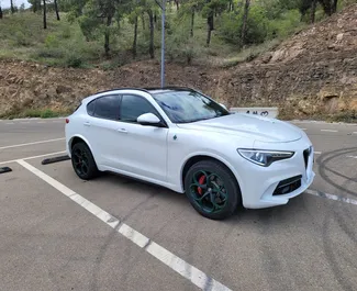 Alfa Romeo Stelvio Quadrifoglio 2018 biludlejning i Georgien, med ✓ Benzin brændstof og 510 hestekræfter ➤ Starter fra 620 GEL pr. dag.