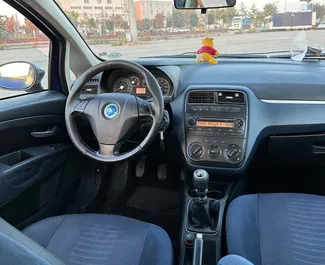 Najem avtomobila Fiat Punto 2009 v v Albaniji, z značilnostmi ✓ gorivo Bencin in 130 konjskih moči ➤ Od 18 EUR na dan.