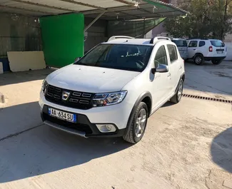 Aluguel de carro Dacia Sandero Stepway 2017 na Albânia, com ✓ combustível Gasóleo e  cavalos de potência ➤ A partir de 17 EUR por dia.