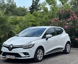 Front view of a rental Renault Clio 4 in Becici, Montenegro ✓ Car #4277. ✓ Manual TM ✓ 5 reviews.