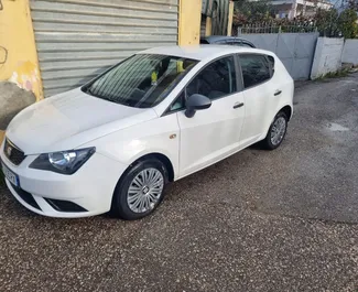 Sprednji pogled najetega avtomobila SEAT Ibiza v v Tirani, Albanija ✓ Avtomobil #11307. ✓ Menjalnik Priročnik TM ✓ Mnenja 0.