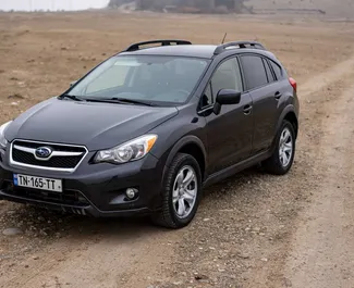 Frontvisning av en leiebil Subaru Crosstrek i Tbilisi, Georgia ✓ Bil #10435. ✓ Automatisk TM ✓ 0 anmeldelser.