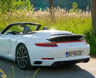 Ενοικίαση αυτοκινήτου Porsche 911 Carrera S Cabrio 2014 στο Μαυροβούνιο, περιλαμβάνει ✓ καύσιμο Βενζίνη και 390 ίππους ➤ Από 400 EUR ανά ημέρα.