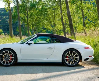 Ενοικίαση αυτοκινήτου Porsche 911 Carrera S Cabrio #2480 με κιβώτιο ταχυτήτων Αυτόματο στο Becici, εξοπλισμένο με κινητήρα 3,8L ➤ Από Ivan στο Μαυροβούνιο.