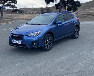 Sprednji pogled najetega avtomobila Subaru Crosstrek v v Tbilisiju, Georgia ✓ Avtomobil #12220. ✓ Menjalnik Samodejno TM ✓ Mnenja 0.