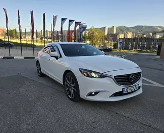 Frontvisning av en leiebil Mazda 6 i Tbilisi, Georgia ✓ Bil #13407. ✓ Automatisk TM ✓ 0 anmeldelser.