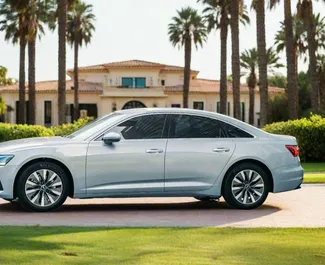 Audi A6 2023 disponible para alquilar en Dubai, con límite de millaje de ilimitado.