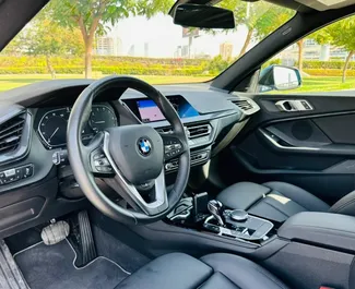 Ενοικίαση αυτοκινήτου BMW 218i 2021 στα Ηνωμένα Αραβικά Εμιράτα, περιλαμβάνει ✓ καύσιμο Βενζίνη και 228 ίππους ➤ Από 350 AED ανά ημέρα.