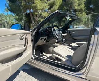 BMW 120d Cabrio 2010 k dispozici k pronájmu v Alicante, s omezením ujetých kilometrů 250 km/den.