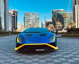 Frontvisning av en leiebil Lamborghini Huracan STO i Dubai, De Forente Arabiske Emirater ✓ Bil #13602. ✓ Automatisk TM ✓ 0 anmeldelser.