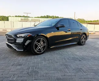 Frontvisning av en leiebil Mercedes-Benz C300 Cabrio i Dubai, De Forente Arabiske Emirater ✓ Bil #13614. ✓ Automatisk TM ✓ 0 anmeldelser.
