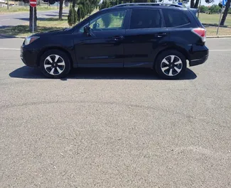Přední pohled na pronájem Subaru Forester v Tbilisi, Georgia ✓ Auto č. 13669. ✓ Převodovka Automatické TM ✓ Recenze 0.