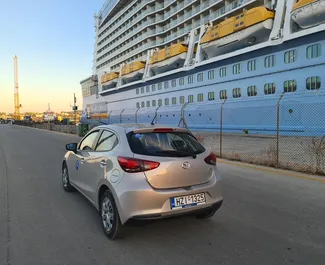 Framvy av en hyrbil Mazda 2 i Chania, Grekland ✓ Bil #9531. ✓ Växellåda Manual TM ✓ 1 recensioner.