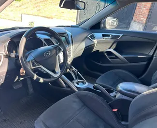 Hyundai Veloster 대여. 조지아에서에서 대여 가능한 편안함 차량 ✓ 보증금 없음 ✓ TPL, SCDW, FDW, 도난, 보증금 없음 보험 옵션.