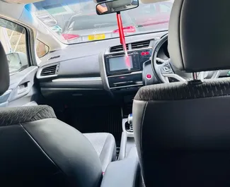 Vista frontal de um aluguel Honda Fit na Maurícia, Maurícia ✓ Carro #14452. ✓ Transmissão Automático TM ✓ 0 avaliações.