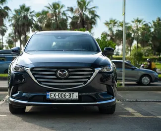 Μπροστινή όψη ενοικιαζόμενου Mazda CX-9 στο Μπατούμι, Γεωργία ✓ Αριθμός αυτοκινήτου #14451. ✓ Κιβώτιο ταχυτήτων Αυτόματο TM ✓ 0 κριτικές.