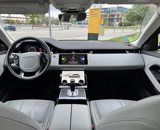 Najem avtomobila Land Rover Range Rover Evoque 2020 v v Španiji, z značilnostmi ✓ gorivo Hibridni in  konjskih moči ➤ Od 100 EUR na dan.