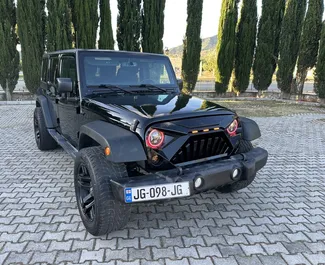 Kiralık bir Jeep Wrangler Tiflis'te, Gürcistan ön görünümü ✓ Araç #14803. ✓ Otomatik TM ✓ 0 yorumlar.