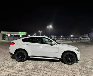 Najem avtomobila BMW X6 2014 v v Albaniji, z značilnostmi ✓ gorivo Dizel in  konjskih moči ➤ Od 82 EUR na dan.