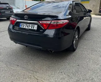 Biluthyrning av Toyota Camry 2017 i i Georgien, med funktioner som ✓ Bensin bränsle och 250 hästkrafter ➤ Från 100 GEL per dag.