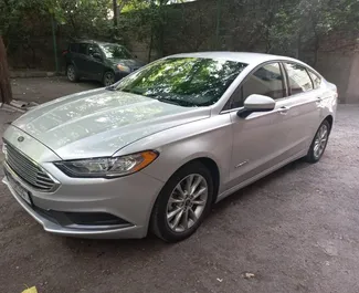Interiér Ford Fusion Sedan k pronájmu v Gruzii. Skvělé auto s 5 sedadly a převodovkou Automatické.