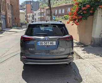 Ενοικίαση αυτοκινήτου Toyota Rav4 L 2016 στη Γεωργία, περιλαμβάνει ✓ καύσιμο Υβριδικό και 180 ίππους ➤ Από 88 GEL ανά ημέρα.
