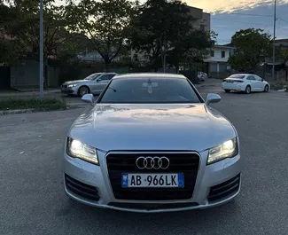 Sprednji pogled najetega avtomobila Audi A7 v v Tirani, Albanija ✓ Avtomobil #14839. ✓ Menjalnik Samodejno TM ✓ Mnenja 0.