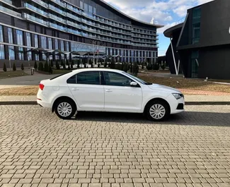 Framvy av en hyrbil Skoda Rapid i Minsk, Vitryssland ✓ Bil #15018. ✓ Växellåda Manual TM ✓ 0 recensioner.