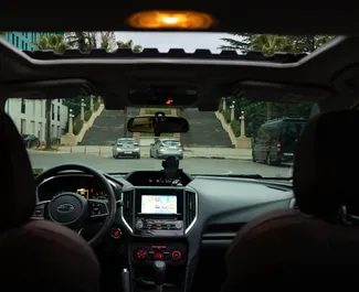 Intérieur de Subaru Impreza à louer en Géorgie. Une excellente voiture de 5 places avec une transmission Automatique.