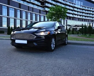 Aluguel de carro Ford Fusion Sedan 2017 na Bielorrússia, com ✓ combustível Gasolina e 181 cavalos de potência ➤ A partir de 46 USD por dia.
