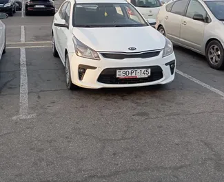 Frontvisning av en leiebil Kia Rio i Baku, Aserbajdsjan ✓ Bil #13505. ✓ Automatisk TM ✓ 0 anmeldelser.