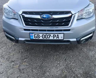 Predný pohľad na prenajaté auto Subaru Forester v v Kutaisi, Georgia ✓ Auto č. 15147. ✓ Prevodovka Automatické TM ✓ Hodnotenia 0.