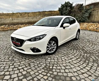 Framvy av en hyrbil Mazda 3 på Burgas Airport, Bulgarien ✓ Bil #15215. ✓ Växellåda Automatisk TM ✓ 0 recensioner.