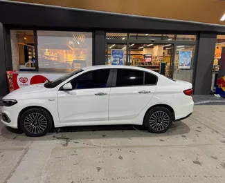 واجهة أمامية لسيارة إيجار Fiat Egea في في مطار دالامان, تركيا ✓ رقم السيارة 15284. ✓ ناقل حركة يدوي ✓ تقييمات 0.