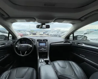 在 在格鲁吉亚 租赁 Ford Fusion Sedan 2019 汽车，特点包括 ✓ 使用 Petrol 燃料和  马力 ➤ 起价 74 GEL 每天。