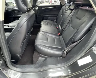 Ford Fusion Sedan 租赁。在 在格鲁吉亚 出租的 舒适性, 高级 汽车 ✓ Without Deposit ✓ 提供 TPL, CDW, Young 保险选项。