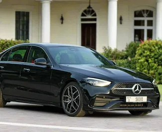 Mercedes-Benz C200 2023 car hire in the UAE, featuring ✓ Petrol fuel and 300 horsepower ➤ Starting from 350 AED per day.