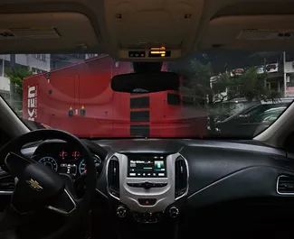 Chevrolet Cruze 2016 automobilio nuoma Gruzijoje, savybės ✓ Benzinas degalai ir 150 arklio galios ➤ Nuo 70 GEL per dieną.