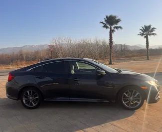 Frontvisning af en udlejnings Honda Civic i Batumi, Georgien ✓ Bil #15519. ✓ Automatisk TM ✓ 0 anmeldelser.