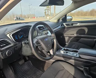 Ford Fusion Sedan udlejning. Komfort, Premium Bil til udlejning i Georgien ✓ Uden depositum ✓ TPL, CDW, Ingen indbetaling forsikringsmuligheder.