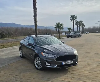 Ford Fusion Sedan 2018 biludlejning i Georgien, med ✓ Benzin brændstof og 188 hestekræfter ➤ Starter fra 113 GEL pr. dag.