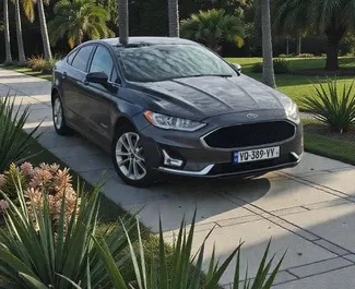 Ford Fusion Sedan 2018 tilgængelig til leje i Batumi, med ubegrænset kilometertæller grænse.