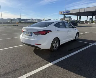 Alquiler de coches Hyundai Elantra 2015 en Albania, con ✓ combustible de Diesel y 90 caballos de fuerza ➤ Desde 20 EUR por día.