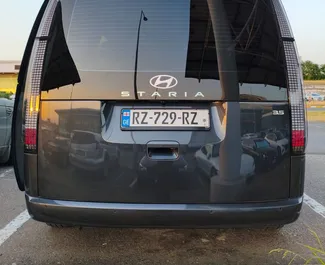 Hyundai Staria 2024 car hire in Georgia, featuring ✓ Petrol fuel and 225 horsepower ➤ Starting from 420 GEL per day.