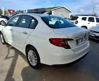 Bilutleie av Fiat Egea 2023 i i Tyrkia, inkluderer ✓ Diesel drivstoff og 95 hestekrefter ➤ Starter fra 20 USD per dag.