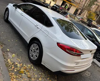 Pronájem auta Ford Fusion Sedan 2020 v Arménii, s palivem Benzín a výkonem 185 koní ➤ Cena od 70 USD za den.