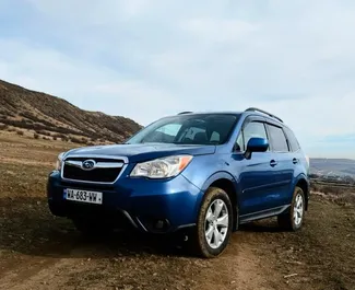 Vista frontal de um aluguel Subaru Forester em Tbilisi, Geórgia ✓ Carro #15674. ✓ Transmissão Automático TM ✓ 0 avaliações.